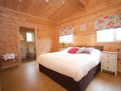 One of the bedrooms in a lodge at Fairview Lodges