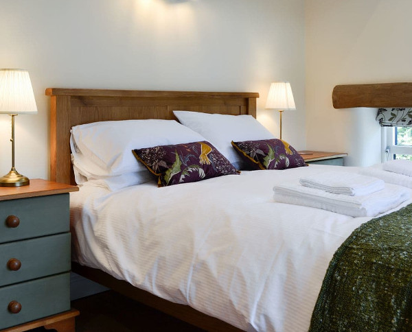 One of the double bedrooms at Reivers Retreat in Denton Mill