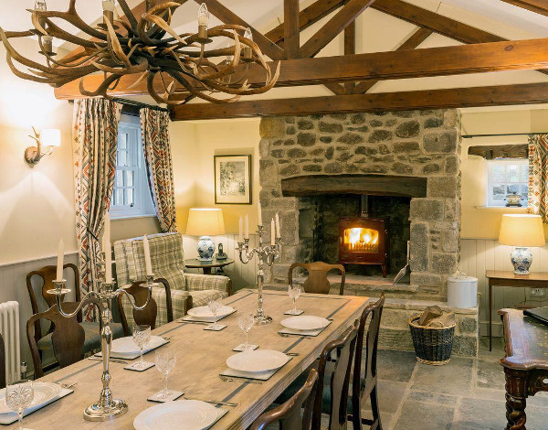 Living room and wood burning stove at Stank House Farm, Bolton Abbey