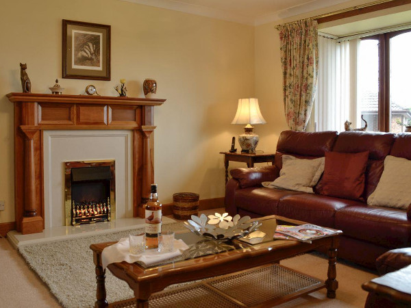 The living room in The Maltings, Lochans