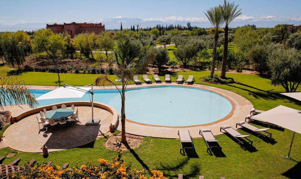 The garden and swimming pool at Villa Abbas, Morocco